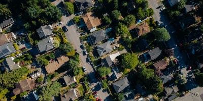 Aerial photo of neighborhood with tree canopy
